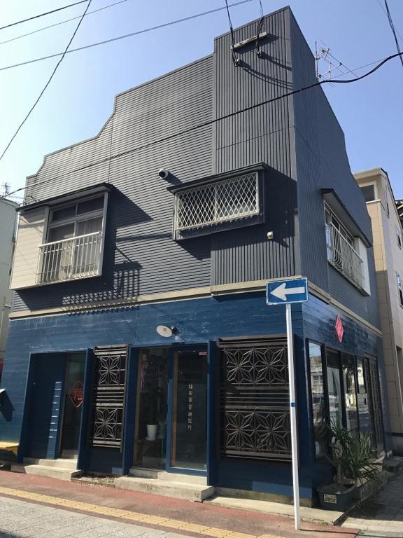 Golden Mile Apartment Amami Bagian luar foto